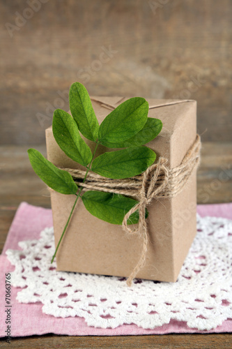 Natural style handcrafted gift box with fresh leaves and rustic