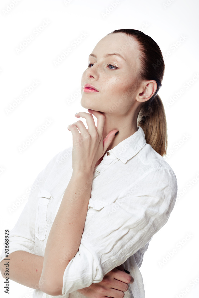 Beautiful business woman in a white shirt, hair in a ponytail on Beautiful business woman in a white shirt, hair in a ponytail on
