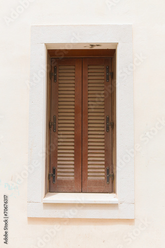 closed wooden shutters © sergeevspb