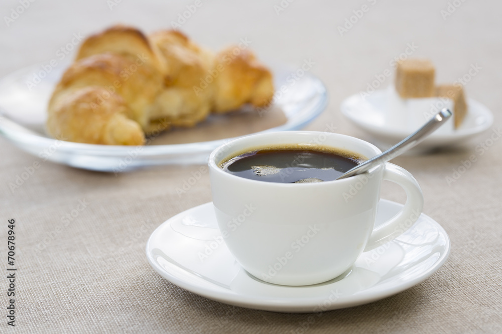 Breakfast with cup of black coffee and croissant Breakfast with cup of black coffee and croissant