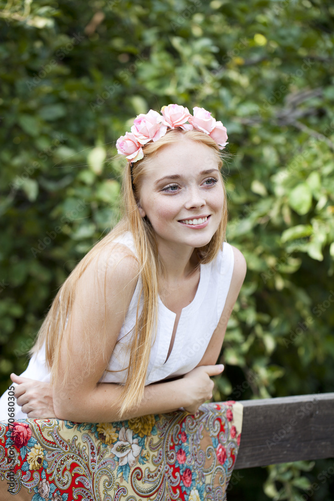 Fototapeta premium Beauty woman with a wreath on head