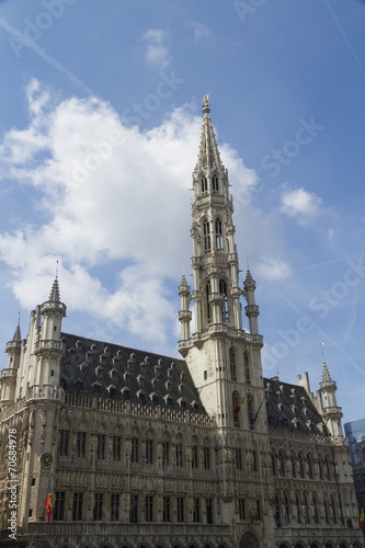 Brussels Town Hall  Grand Place  Belgium. Clouds and blue sky.