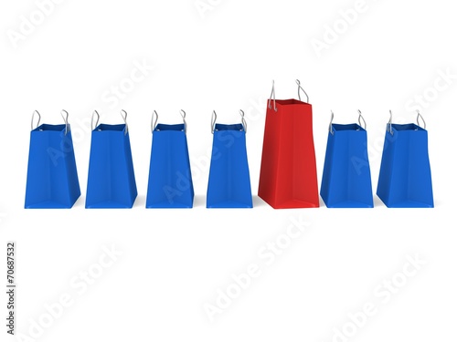 Red shopping bag in a row of blue bags