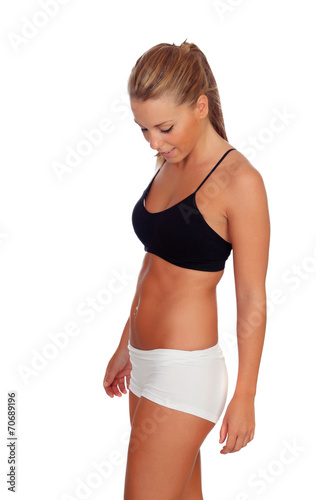 Attractive girl with underwear looking her body