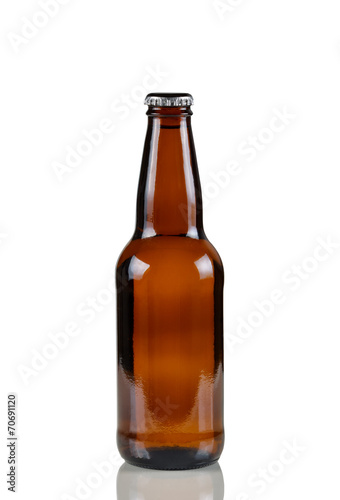 Unopened beer bottle on white with reflection