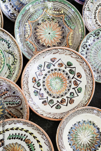 Traditional ceramic plates exposed to a fair