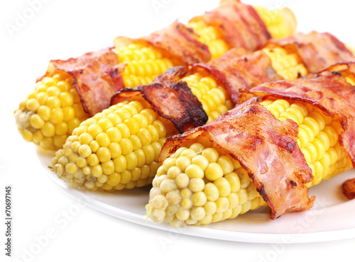 Grilled bacon wrapped corn, isolated on white