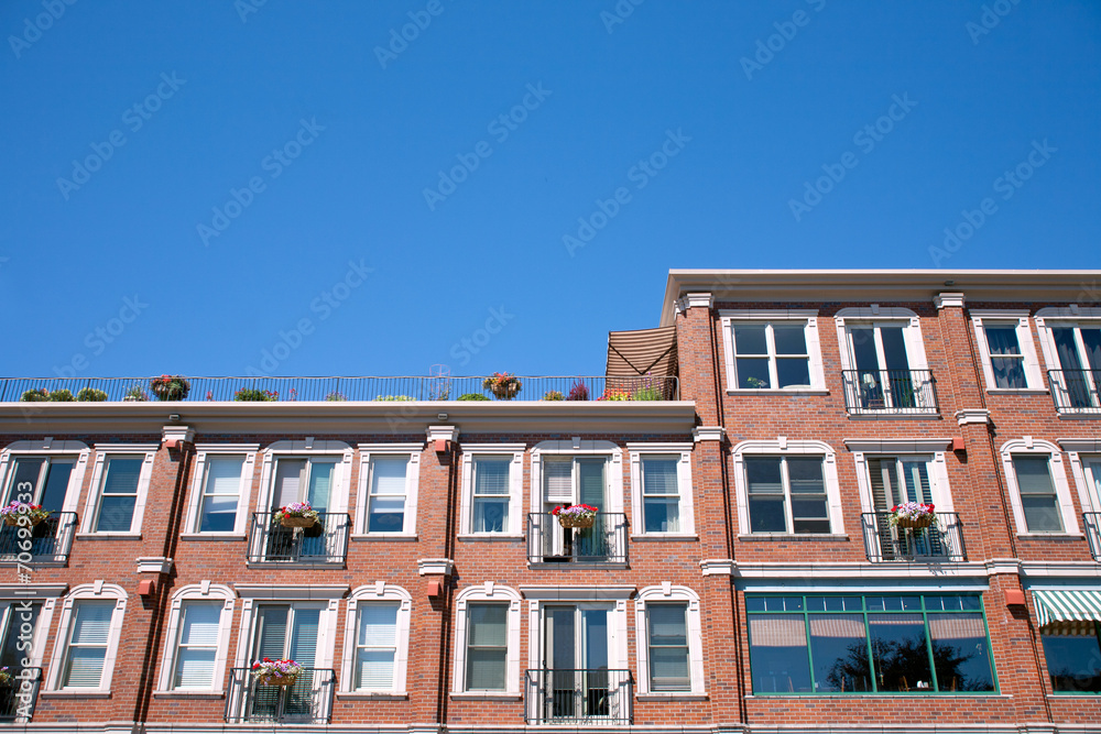 red brick building facade with windows