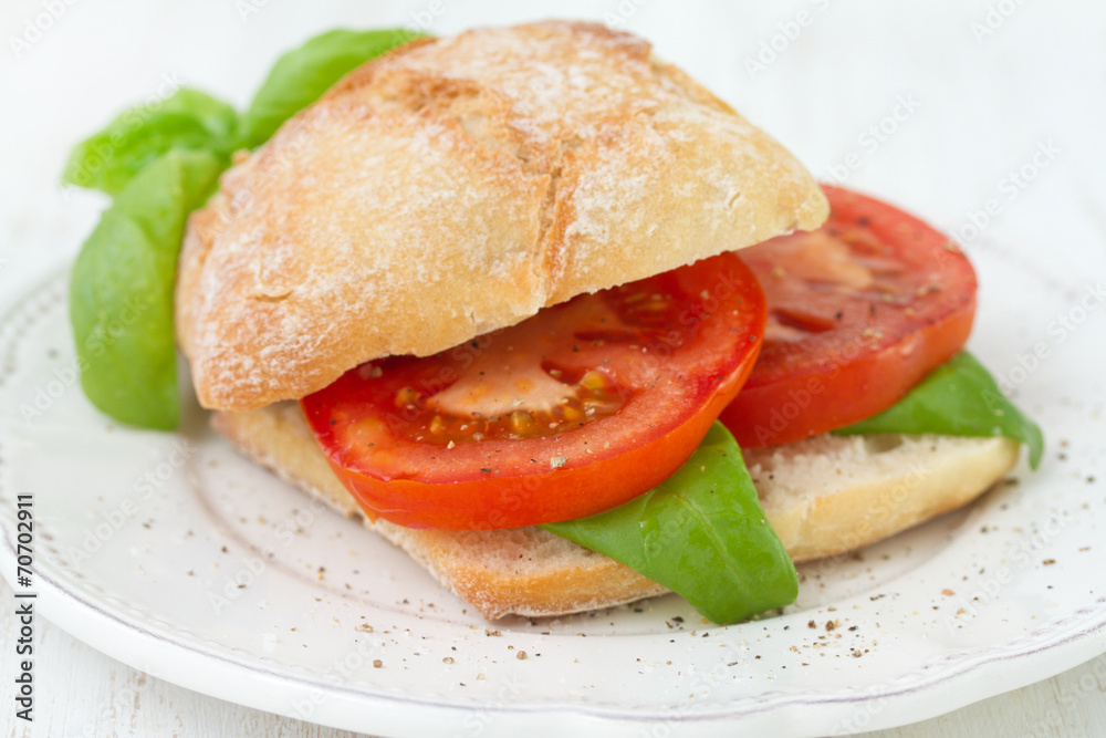 sandwich with tomato and basil on plate sandwich with tomato and basil on plate