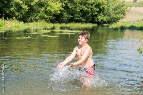 Full 10 years boy swim in river