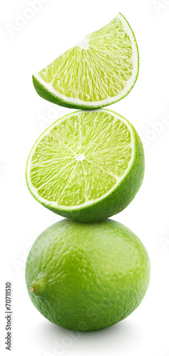 Pyramid of lime citrus fruit isolated on white