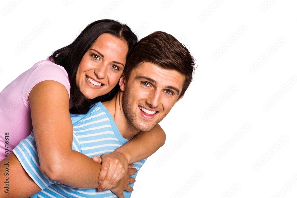 Young couple smiling at the camera Young couple smiling at the camera