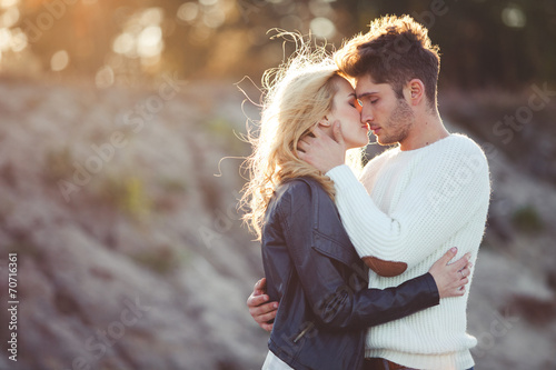 couple in love on the beach in autumn