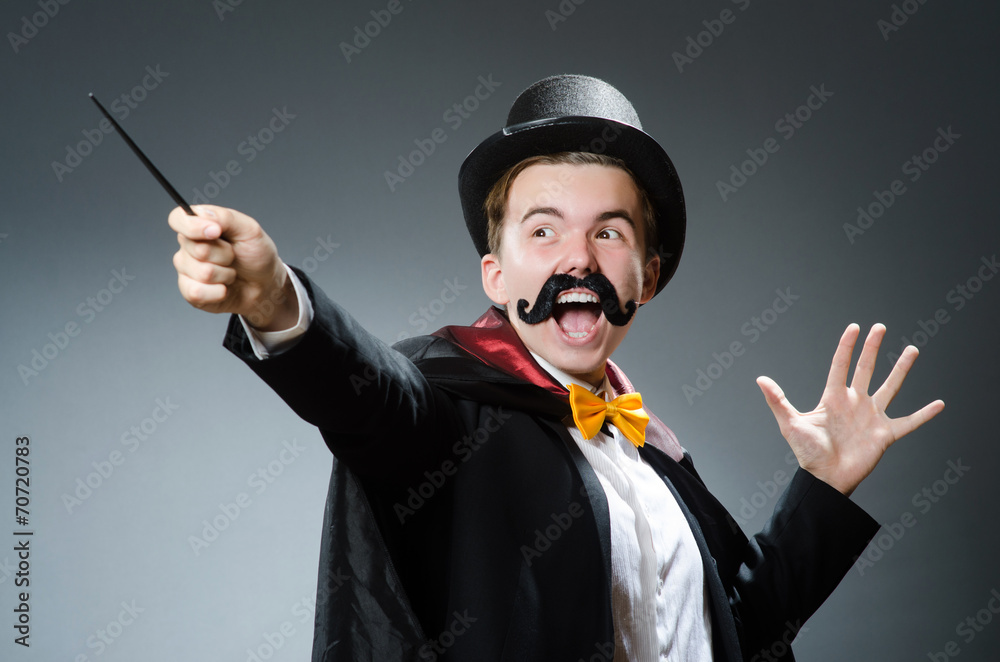 Funny magician with wand and hat Funny magician with wand and hat