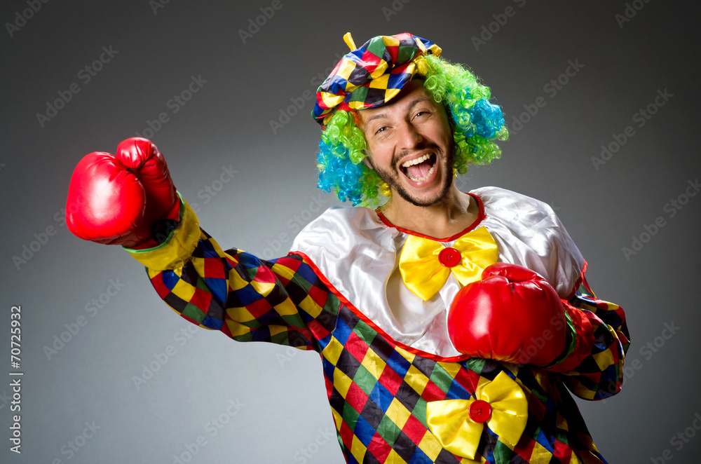 Funny clown with boxing gloves Funny clown with boxing gloves