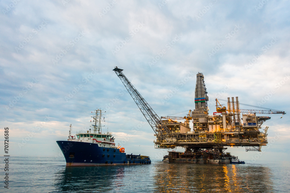 Oil rig platform in the calm sea