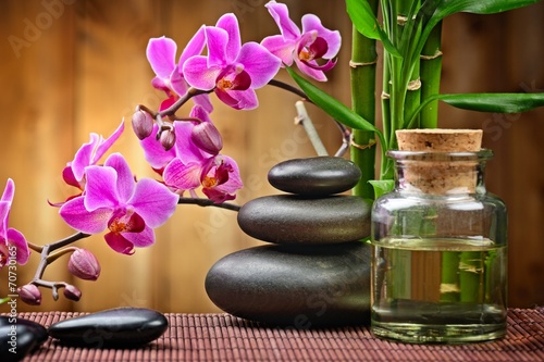 spa concept zen basalt stones and orchid