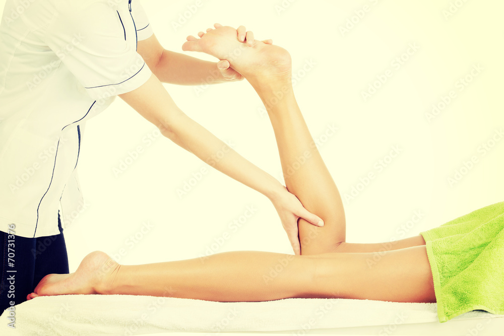 Fototapeta premium Physio therapist trying to fix the legs