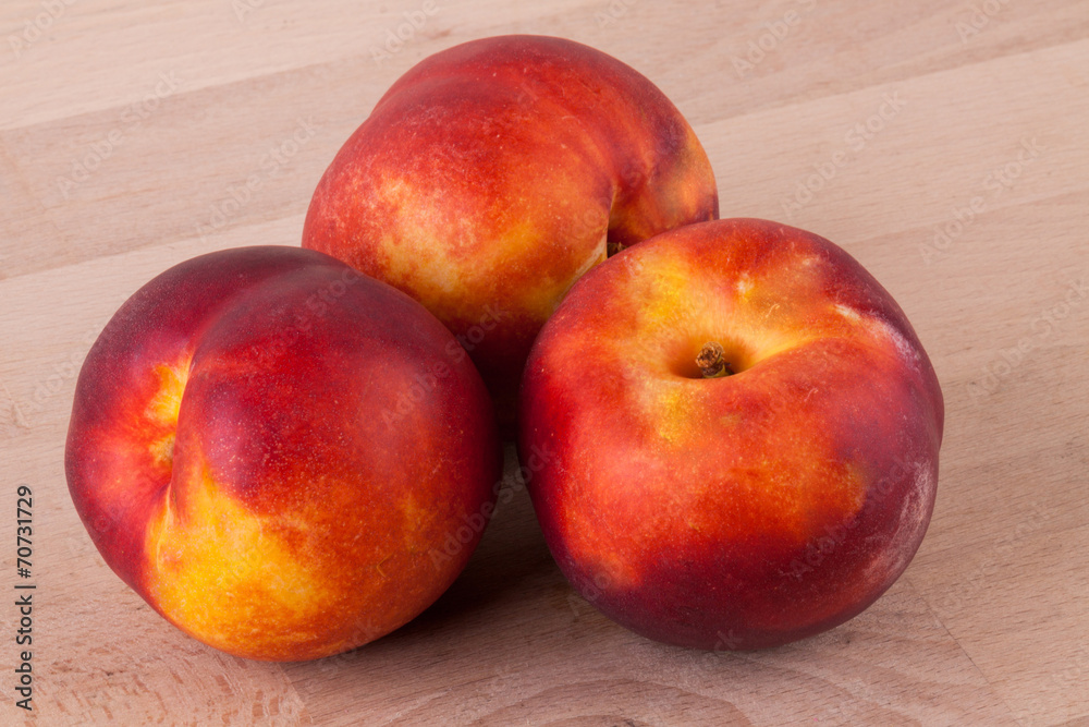 Three tasty fresh ripe juicy nectarines Three tasty fresh ripe juicy nectarines