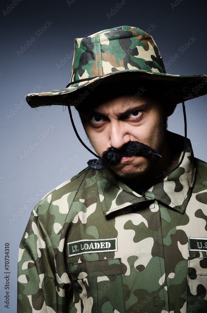 Funny soldier in military concept Funny soldier in military concept