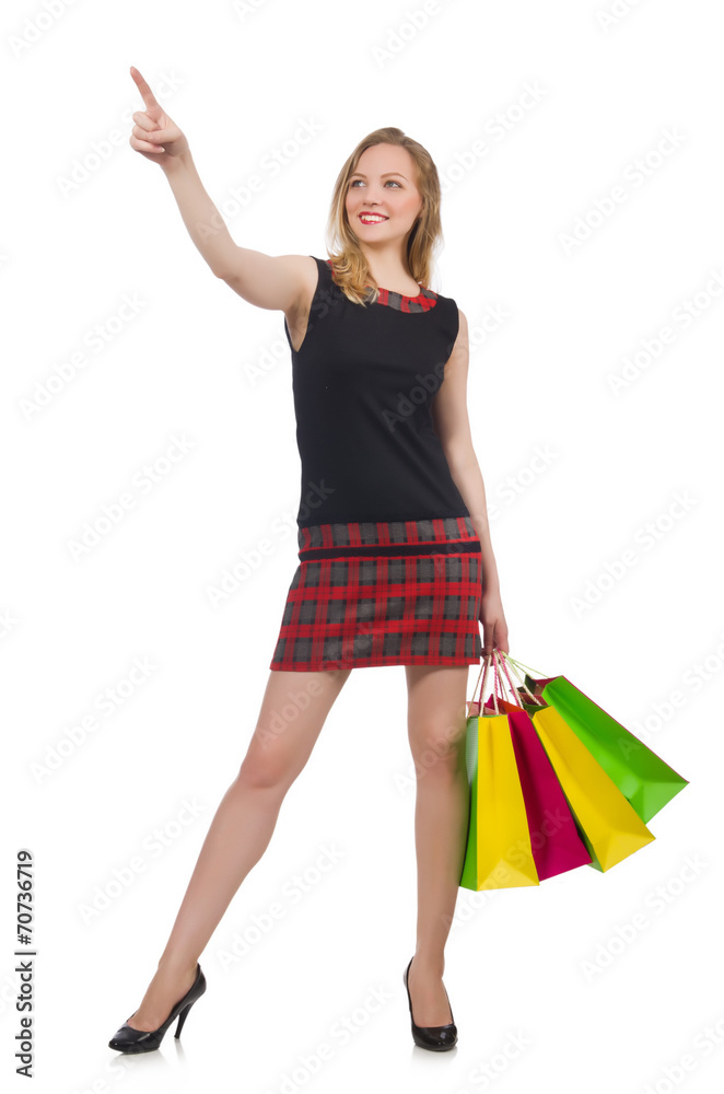 Woman with shopping bags isolated on white Woman with shopping bags isolated on white