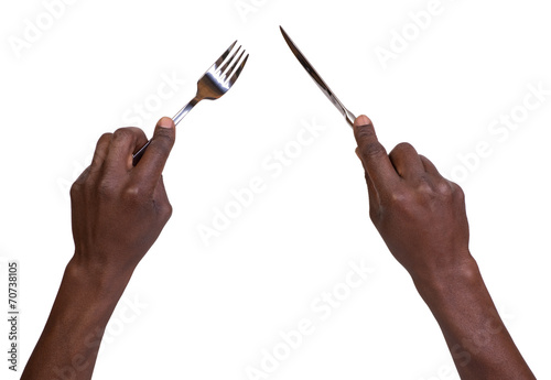 Man holding fork and knife