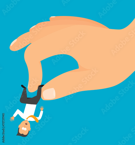 Hand grabbing a tiny businessman or employee