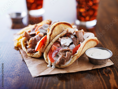 greek gyros with tzatkiki sauce and fries