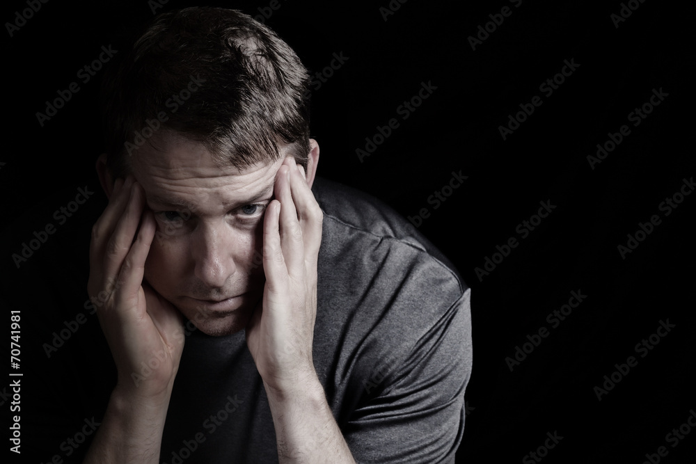 Mature man with headache from stress Mature man with headache from stress