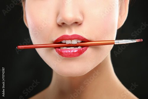 Portrait of young woman with professional make up