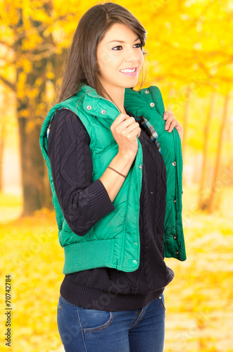 Portrait of beautifiul young brunette girl in autumn photo