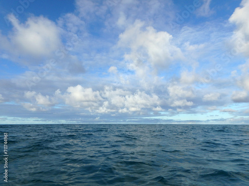 Shallow wavy ocean waters of Waimanalo bay looking into the paci