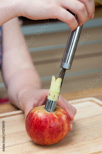 Canvas Print Removing apple's core