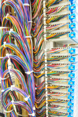 stack of colorful electronic wire in socket board of ditigal tel photo