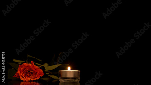 Quadro em tela Single romantic orange rose with a burning candle