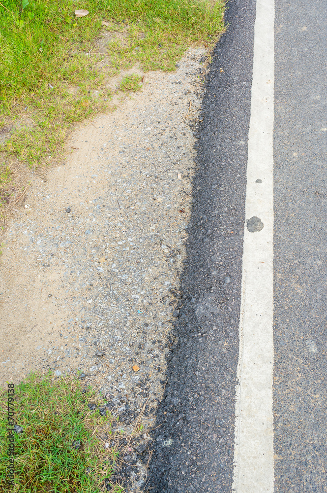 asphalt texture on the road on day time