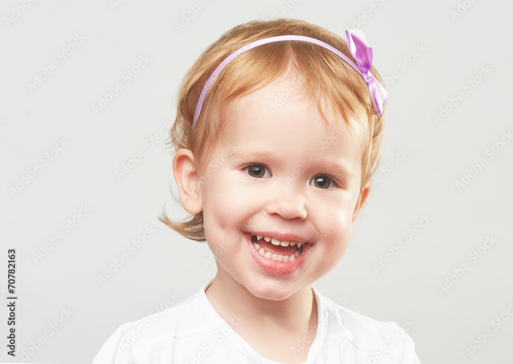 beautiful happy little girl laughing and smiling beautiful happy little girl laughing and smiling