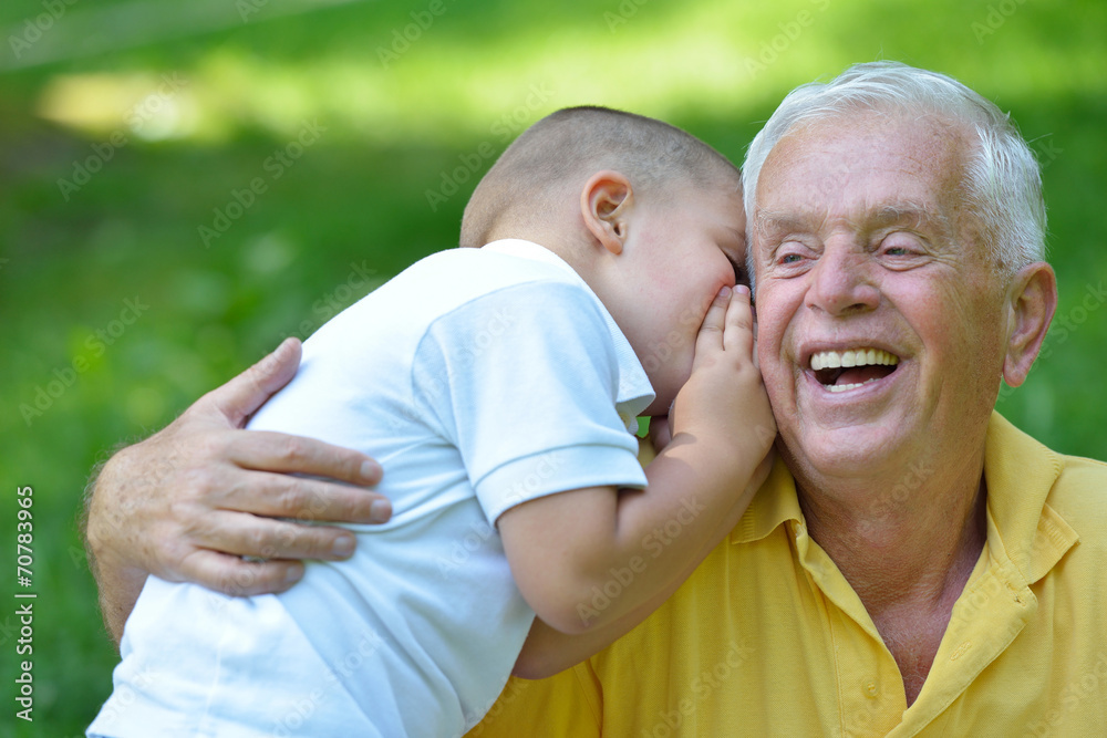 happy grandfather and child in park happy grandfather and child in park
