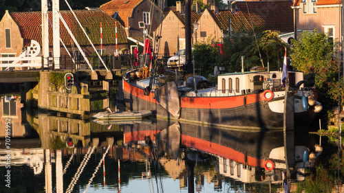 Old historic harbour of Enkhuizen Holland during sunset