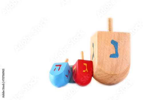 Wooden dreidels for hanukkah isolated on white background.