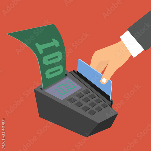 Hand holding a credit card spends in the payment terminal