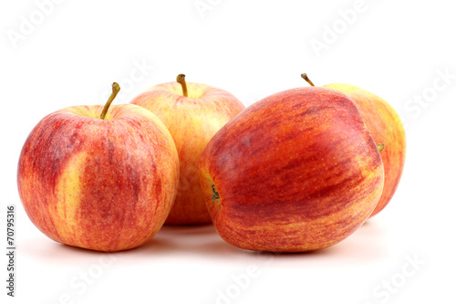 Fresh red apples isolated over white background