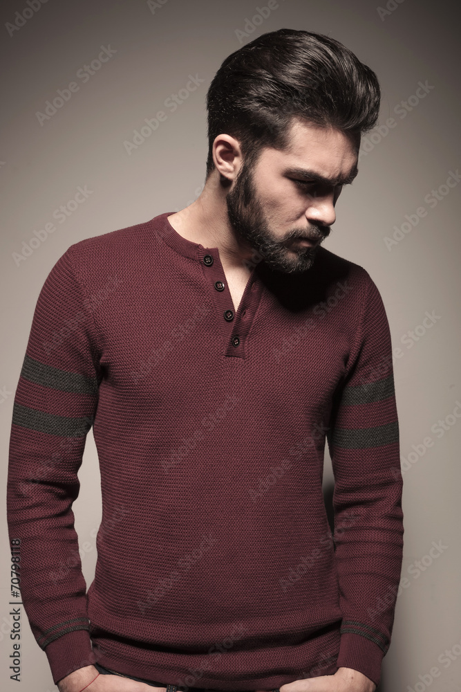 Sad man holding his hands in pocket Sad man holding his hands in pocket