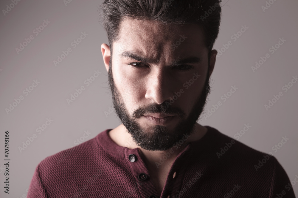 man wearing a sweater and looking at the camera man wearing a sweater and looking at the camera