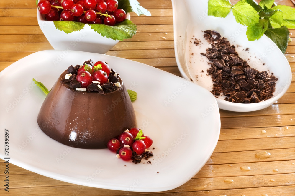 Chocolate pudding with red berries Chocolate pudding with red berries