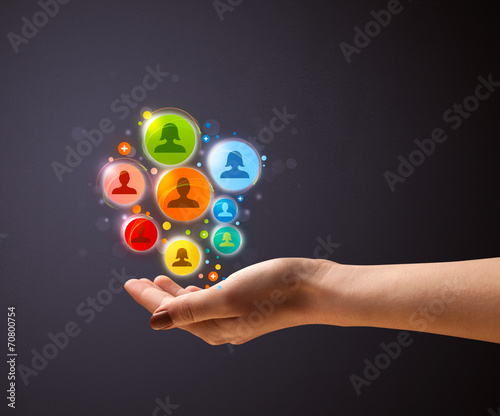 Social network icons in the hand of a woman