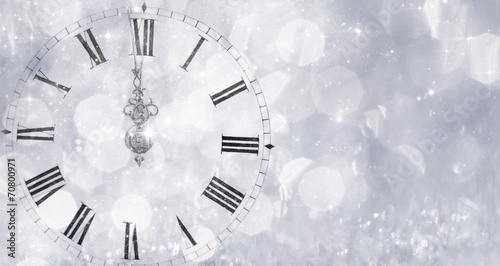 New Year's at midnight - Old clock and holiday lights