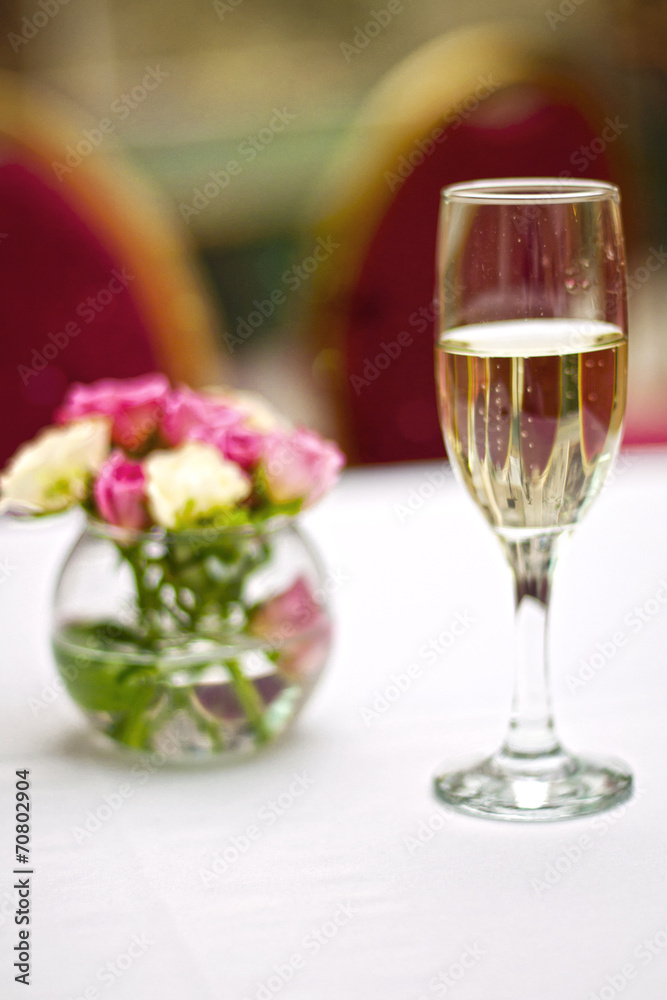 Bouquet of roses and glass of champagne Bouquet of roses and glass of champagne