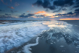 sunrise over North sea coast during low tide