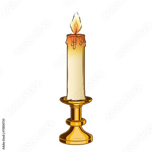 Burning old candle and vintage brass candlestick